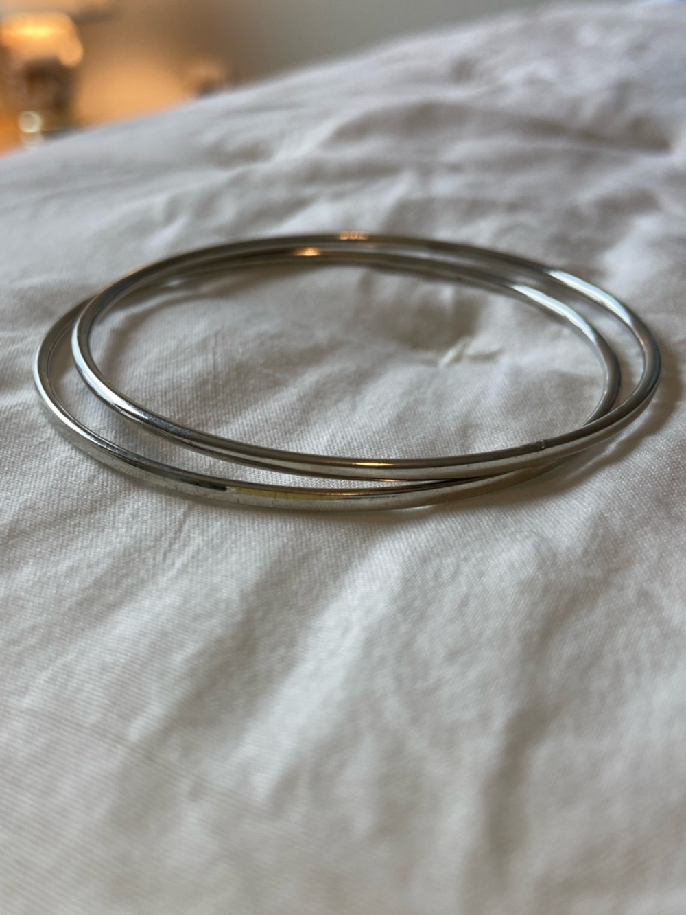 Two silver bangles bracelets